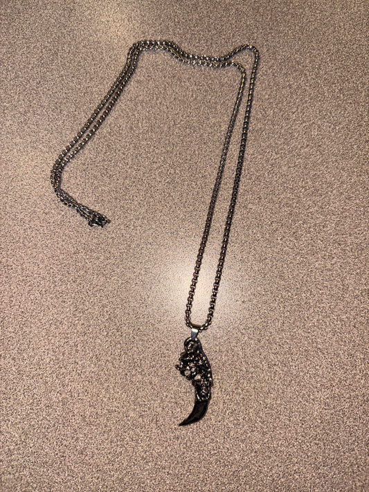 Silver necklace with dagger and dragon face