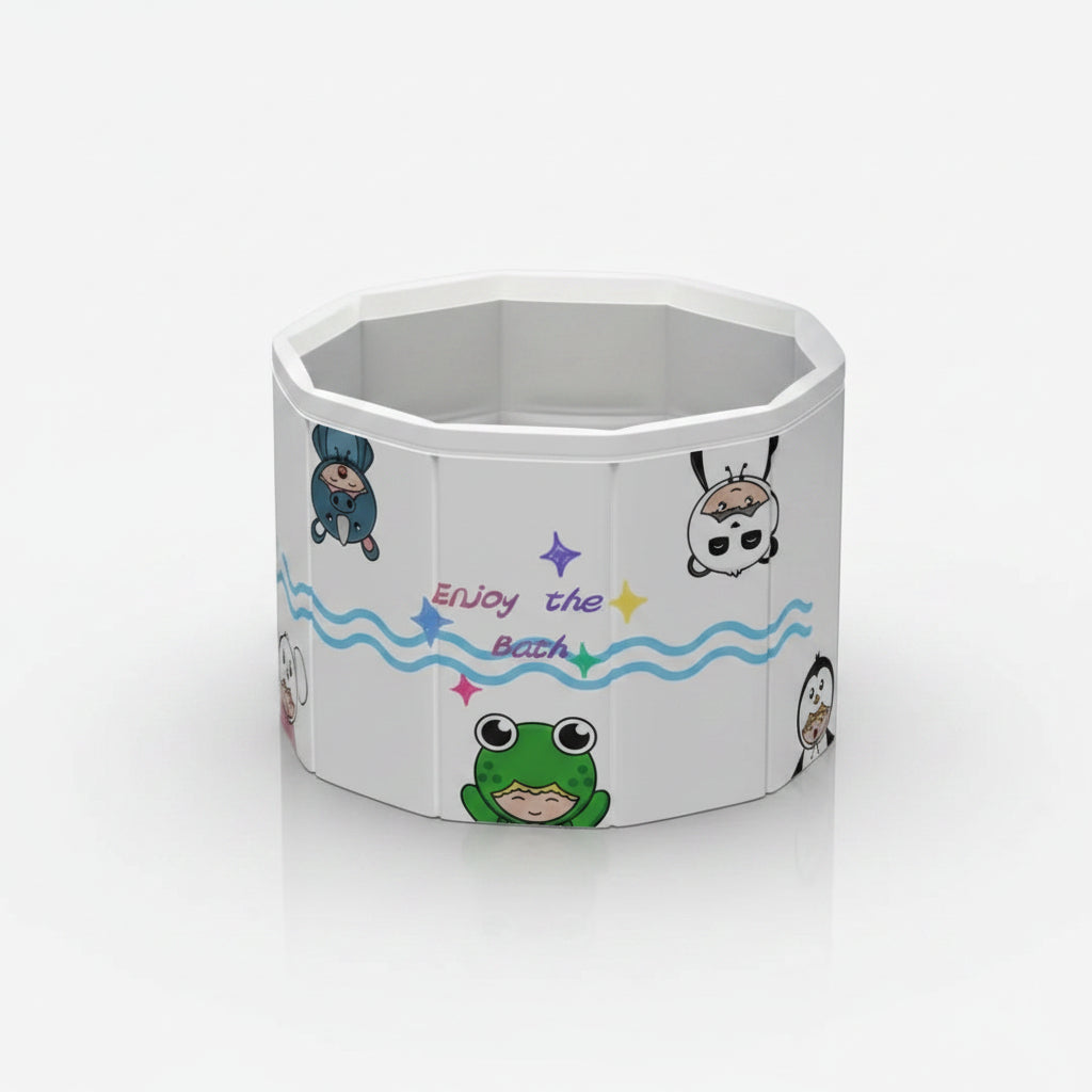 Child playing in a portable foldable toddler bathtub with cartoon designs.